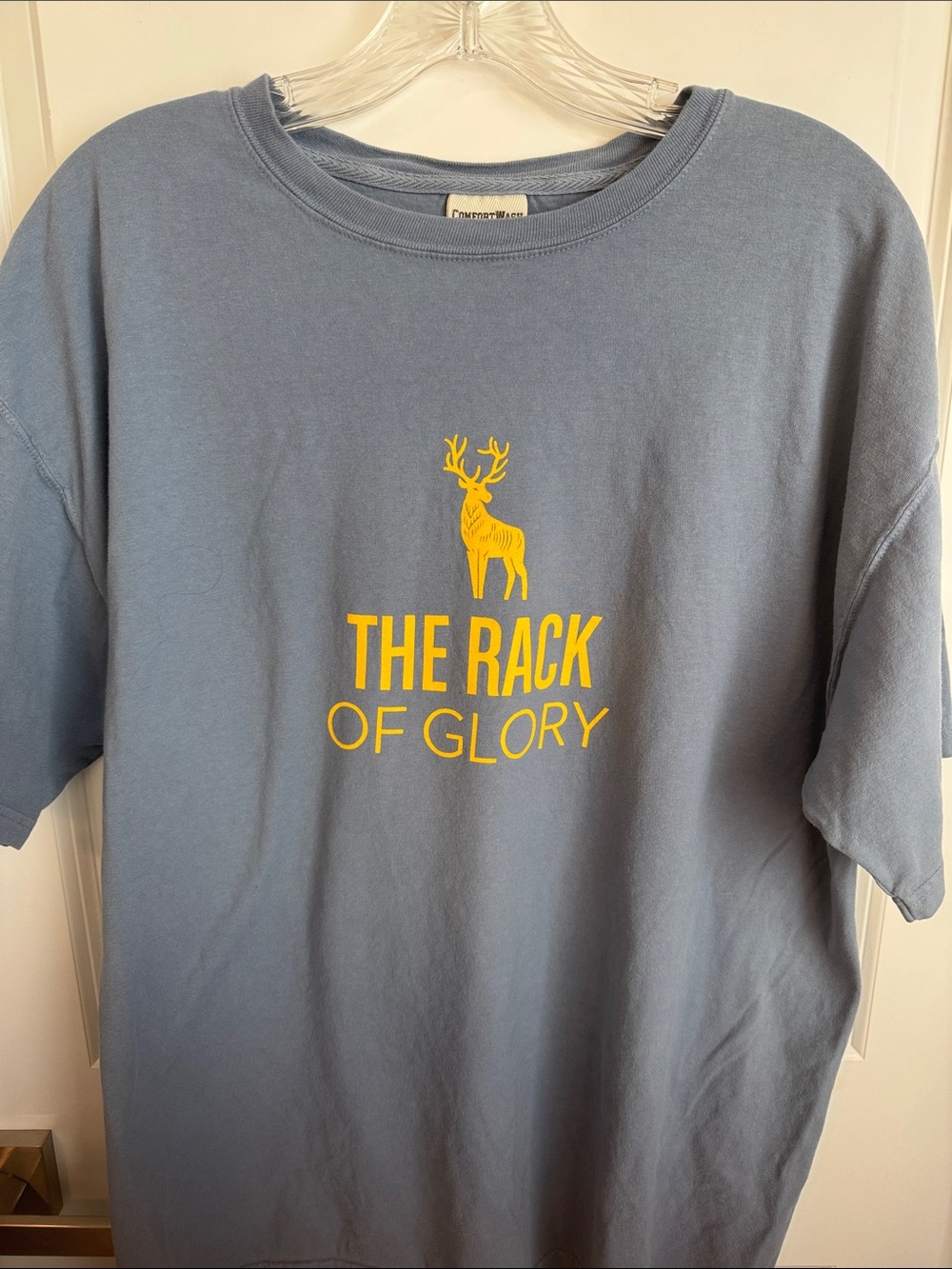 The Rack of Glory Short Sleeve Tee - Light Blue with Yellow Graphic